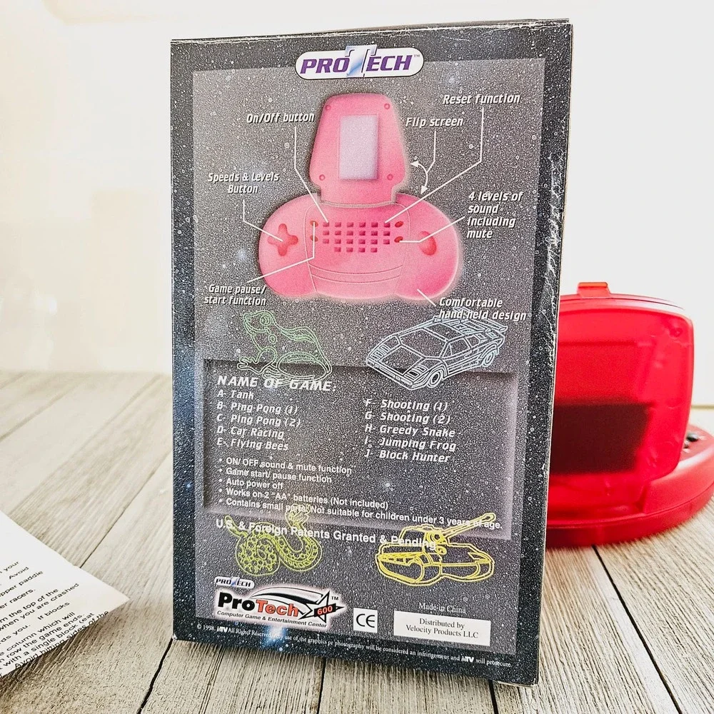 600 Games in One Red Handheld Battery Operated Portable Travel Video Game